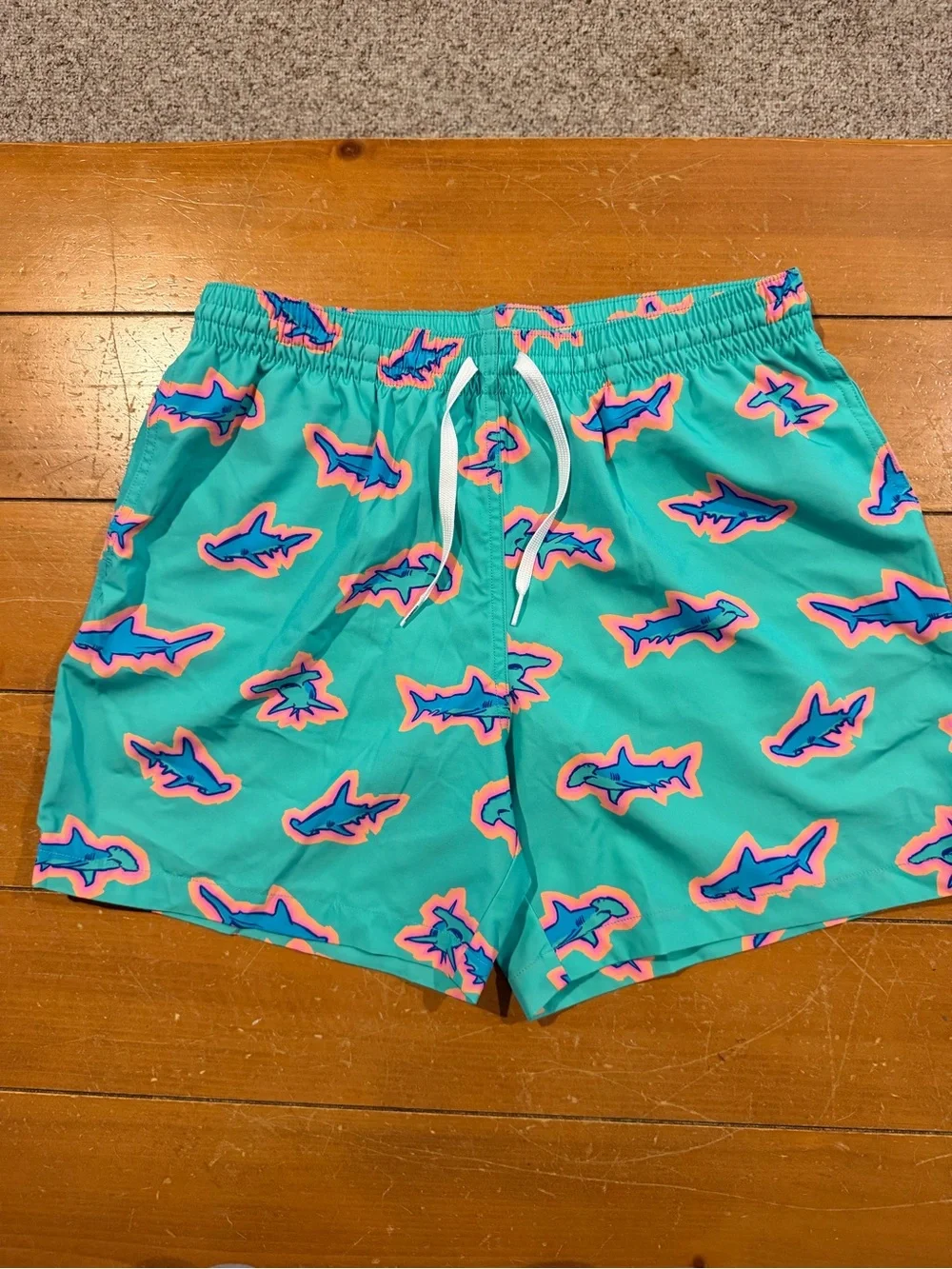 chubbies Turquoise Swim Trunks with Pink and Blue Shark Motif